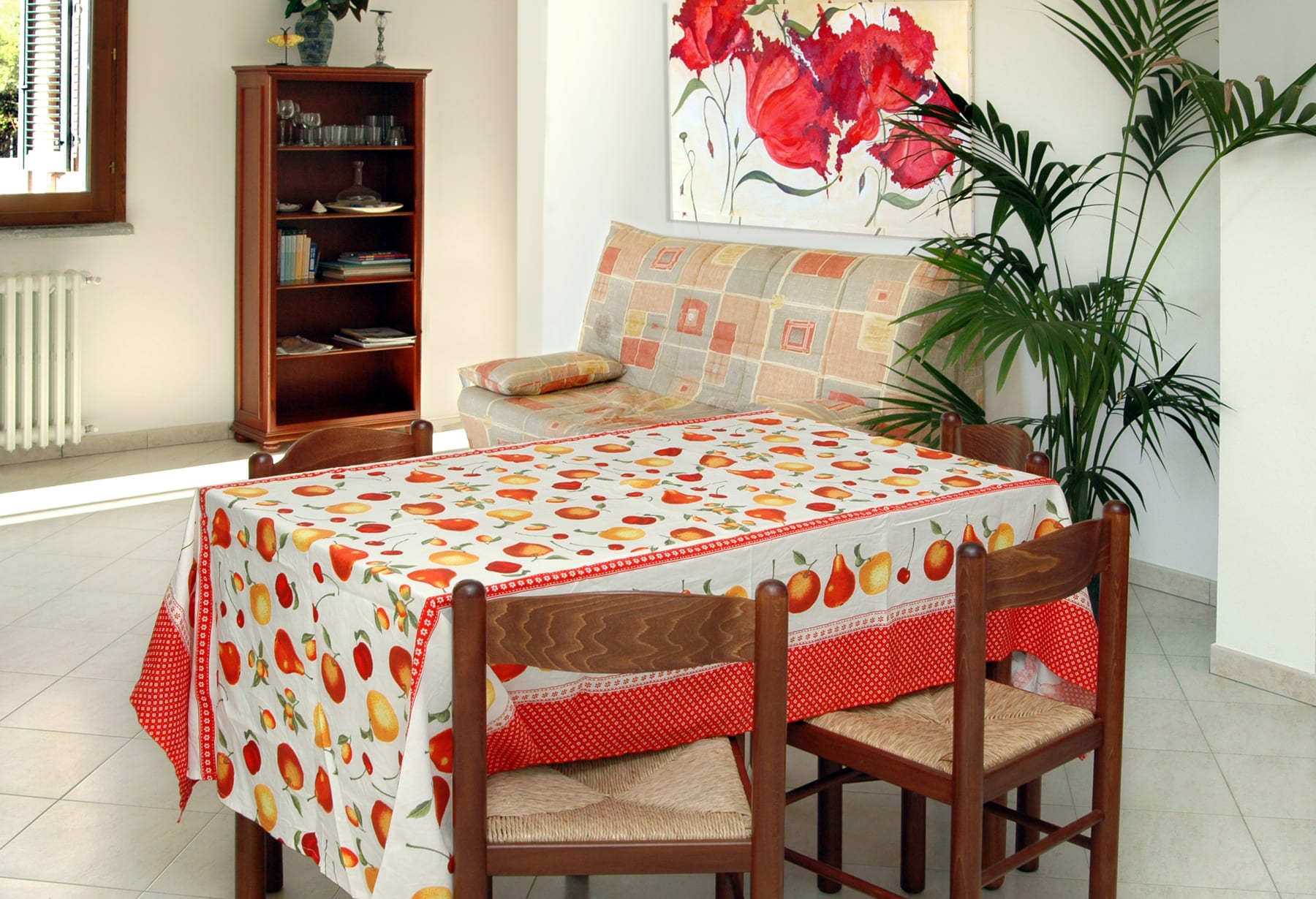 Living and dining area in a Villa Casa Marina apartment